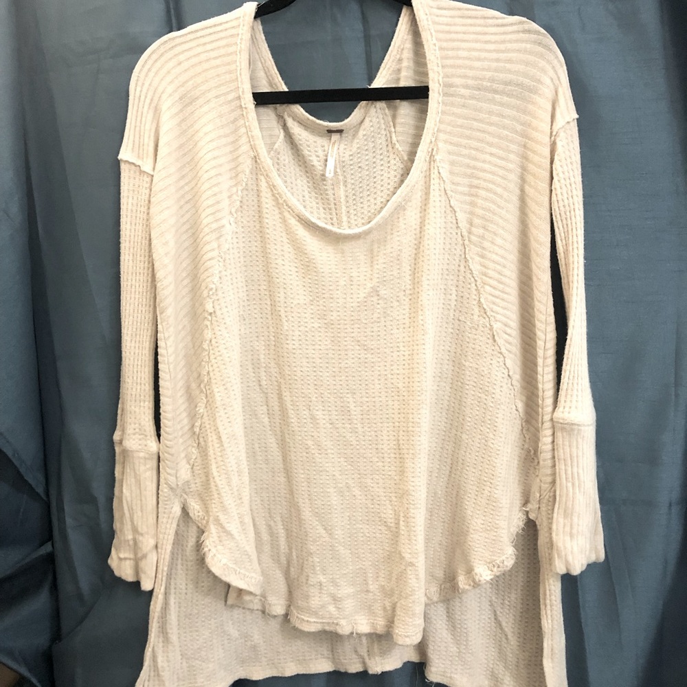 Free People long sleeve loose fitting top sizeS